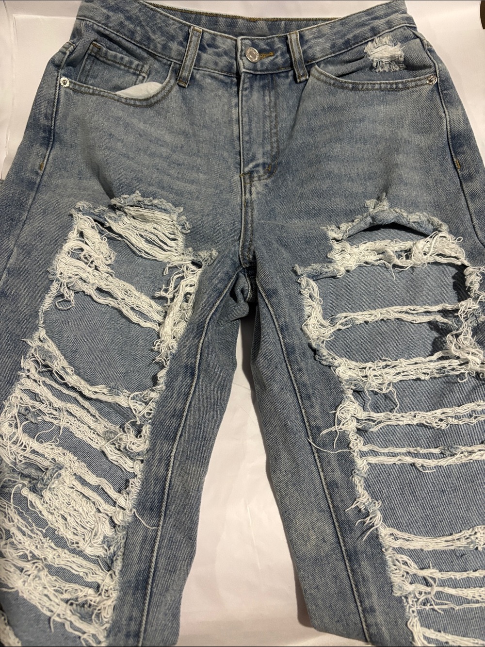 Distressed Light Blue Ripped Jeans